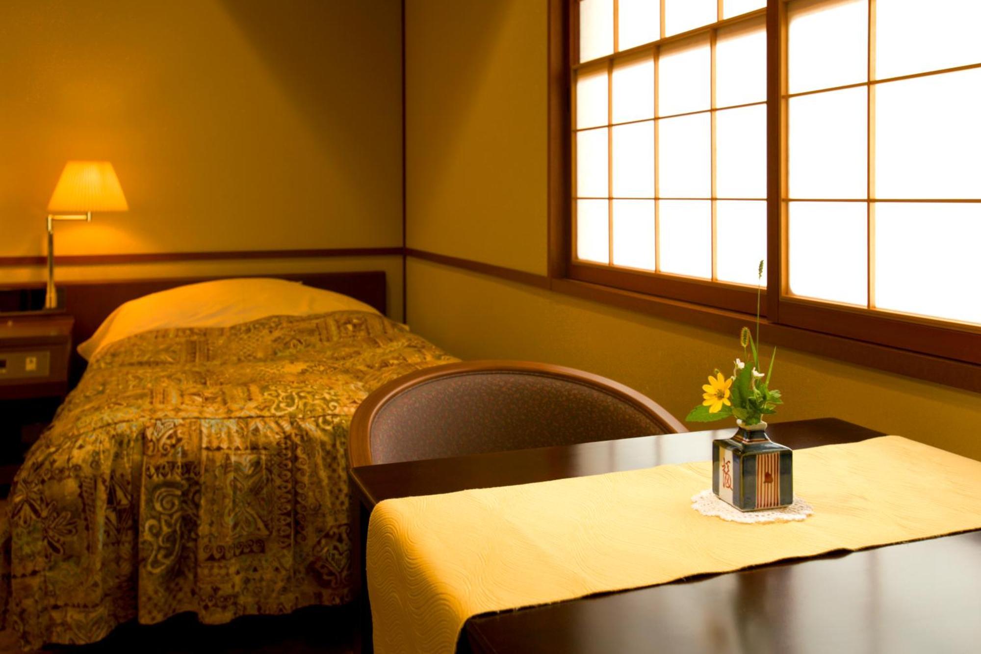 Tachibanaya Hotell Tsuruoka Rum bild